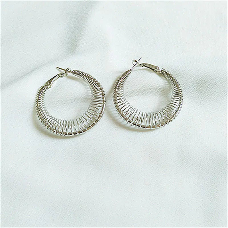 Trendy Spring Curve Earrings in Gold and Silver