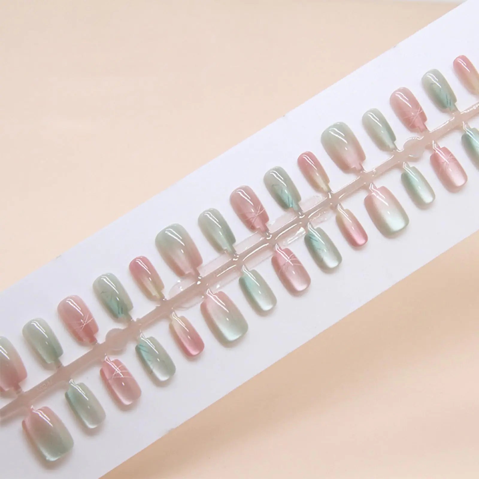 30Pcs Cat Eye Press on Nails with Curve Line Design Gradient Cat Eye Manicure Art Acrylic Short Trapezoid Fake Nails Stick on Nails Glossy Green Ombre Cat Eye False Nails Gel Glue on Nails for Women