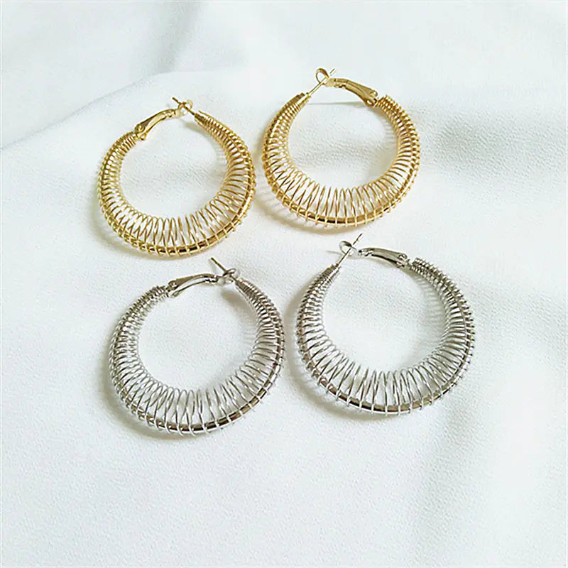 Trendy Spring Curve Earrings in Gold and Silver